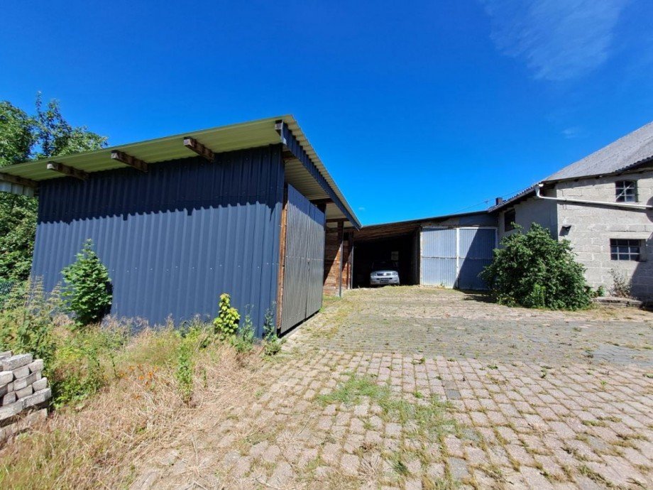 Carport mit Nebengeb�ude Zweifamilienhaus Kappel