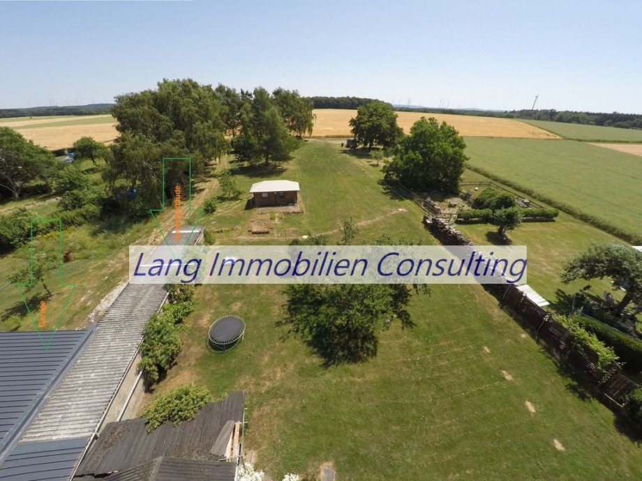 Gr�nfl�che/Nebengeb�ude Mehrfamilienhaus Ebschied